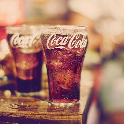 Coca-Cola Fountain Glasses on wood table Image
