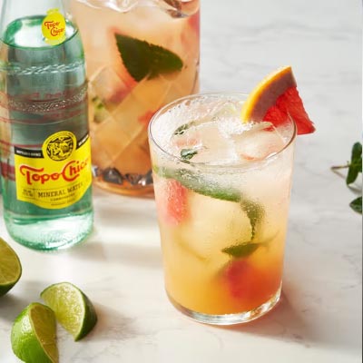 topo chico cocktail in a glass image